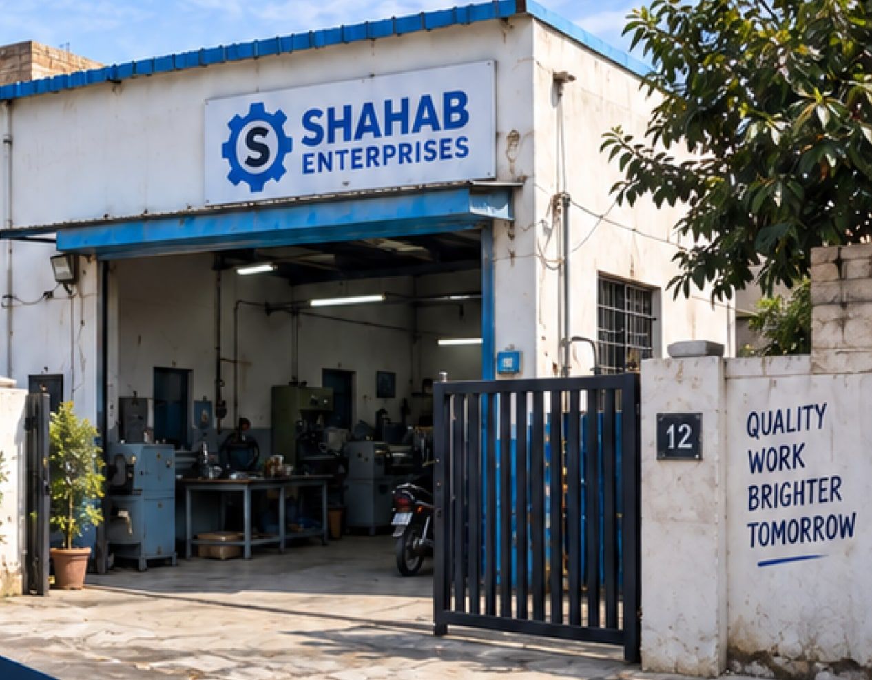 The Shahab Enterprises factory gate in Orangi Town, Karachi, with the workshop open behind it