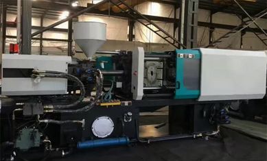 A 240 ton horizontal injection moulding machine